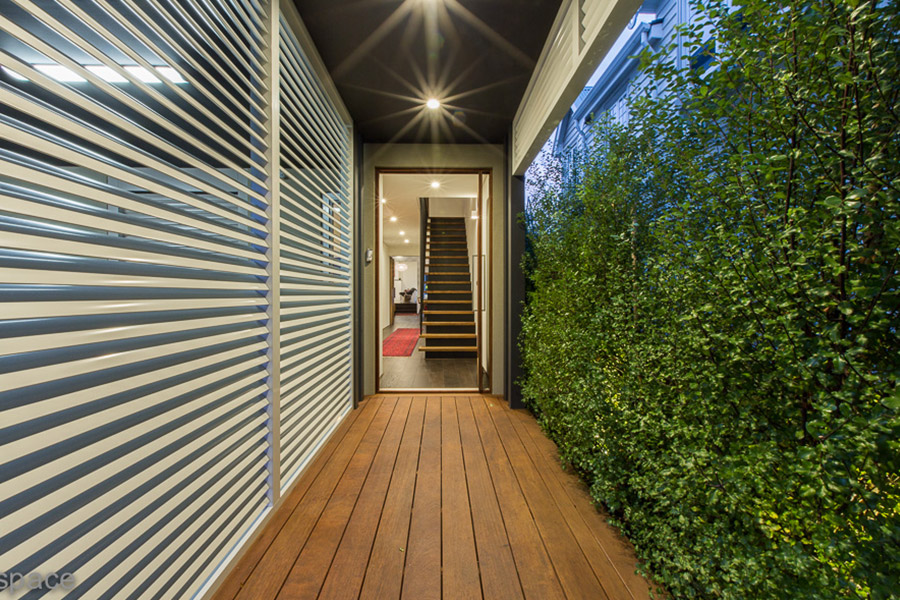 A professional approach to the garden landscaping included the entrance to the home